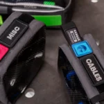 Close-up of storage bags with labeled Velcro patches for misc and cables, ideal for organization.